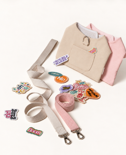 Beige and pink cat harness sets with matching leashes and assorted patches