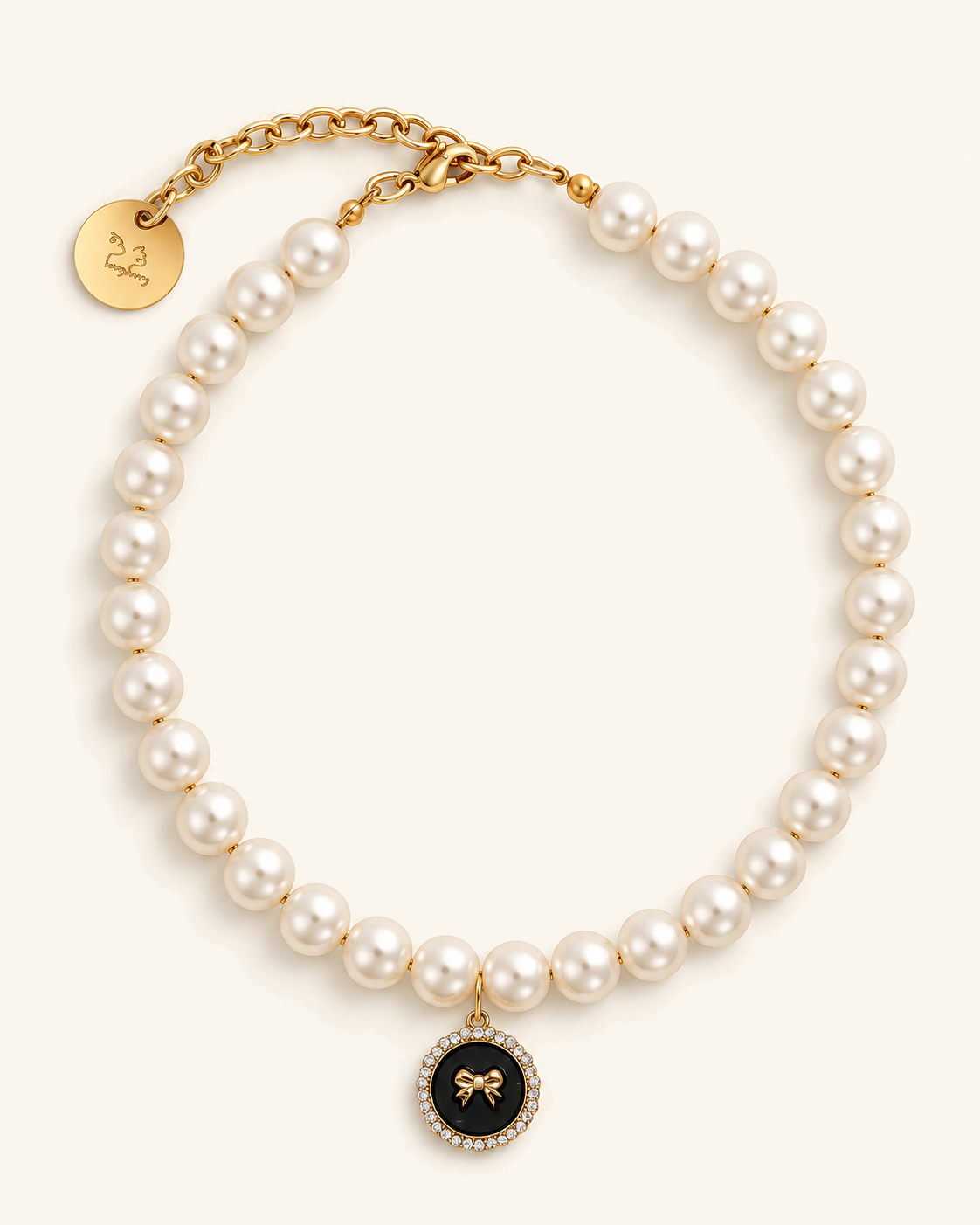Faux pearl necklace with a bow charm