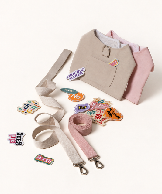 Beige and pink harness sets with leashes and patches